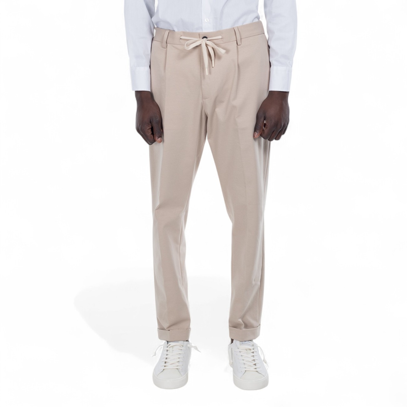 Outfit beige trousers with...