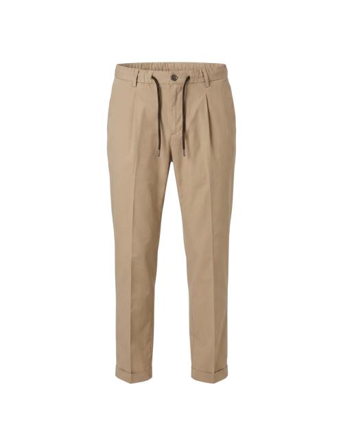 Outfit pantaloni beige con...