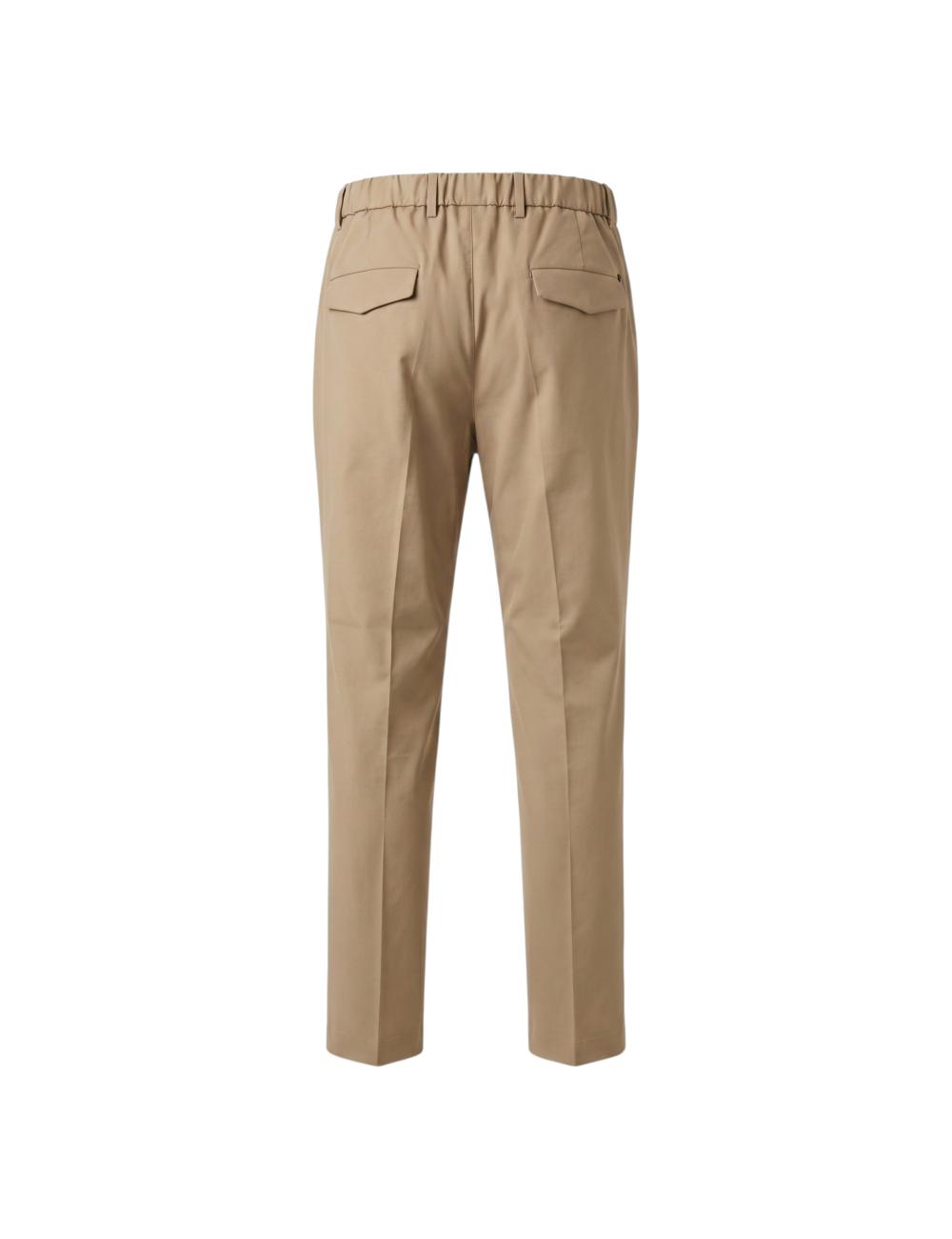 Beige trousers outfit with...