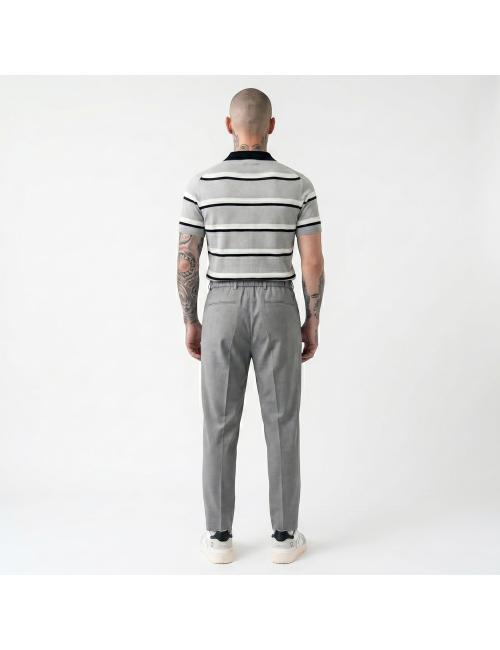 Outfit polo a righe maniche...