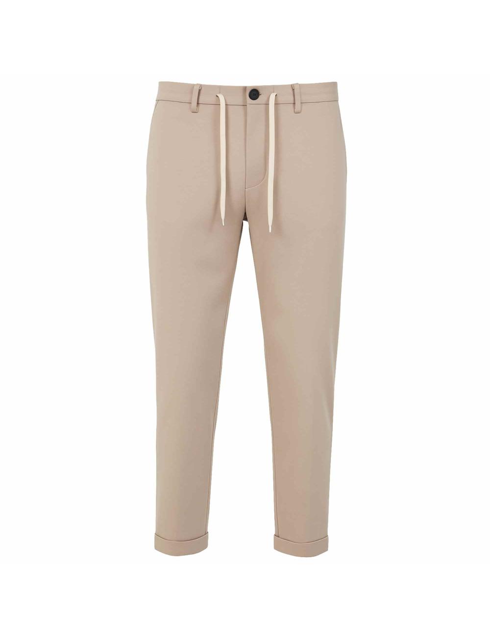 Beige trousers outfit with...