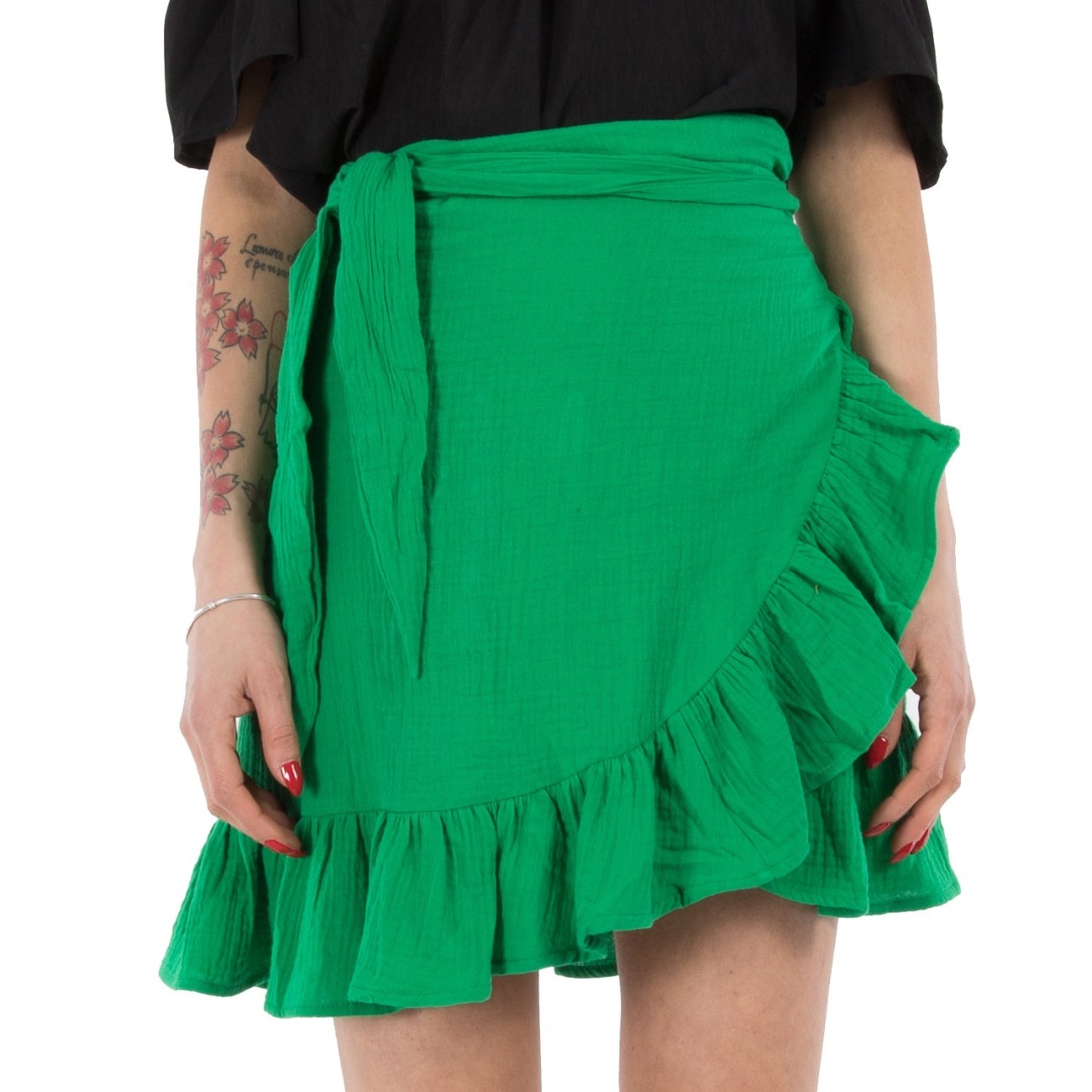 Short mint green skirt with...